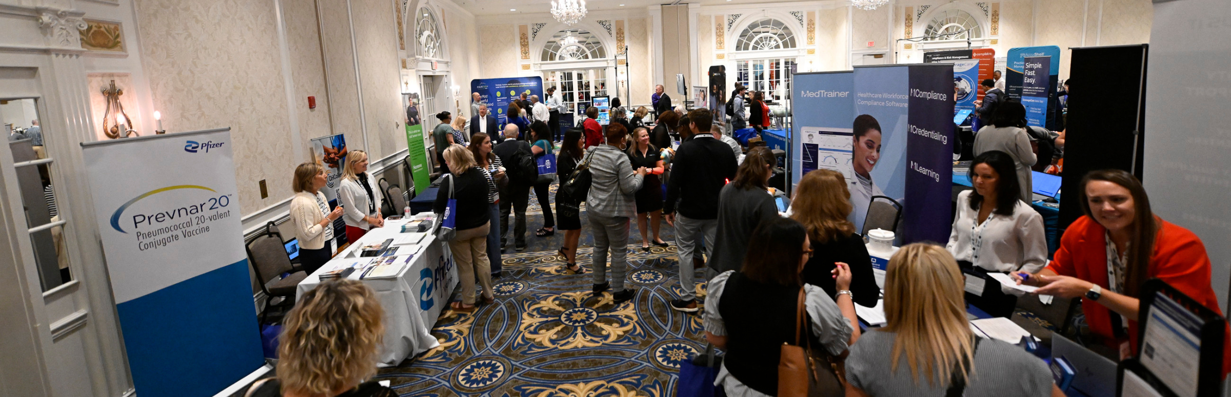 Aerial photo of busy sponsor and exhibitor hall at VCHA Annual Conference