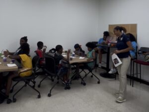 Adrienne leading a nutrition workshop for children,