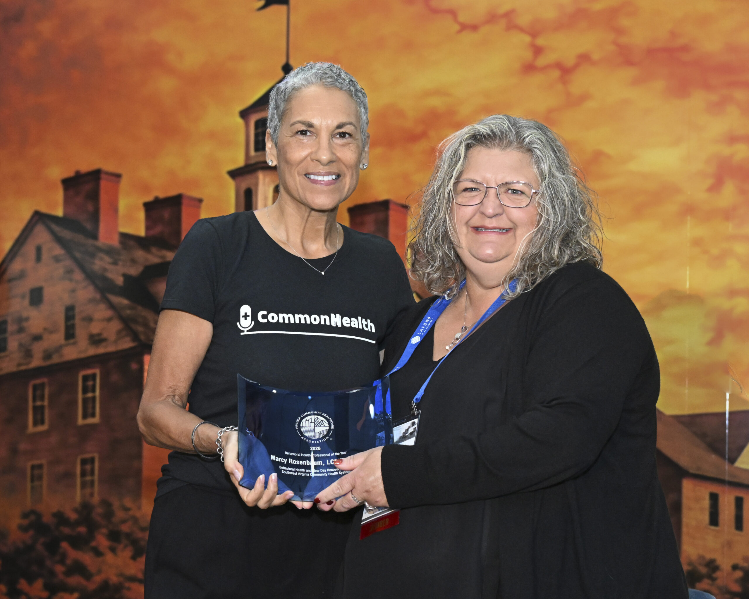 VCHA CEO Tracy Douglas and Southwest Virginia Community Health Systems staff member Marcy Rosenbaum smile while holding the Behavioral Health Professional of the Year award