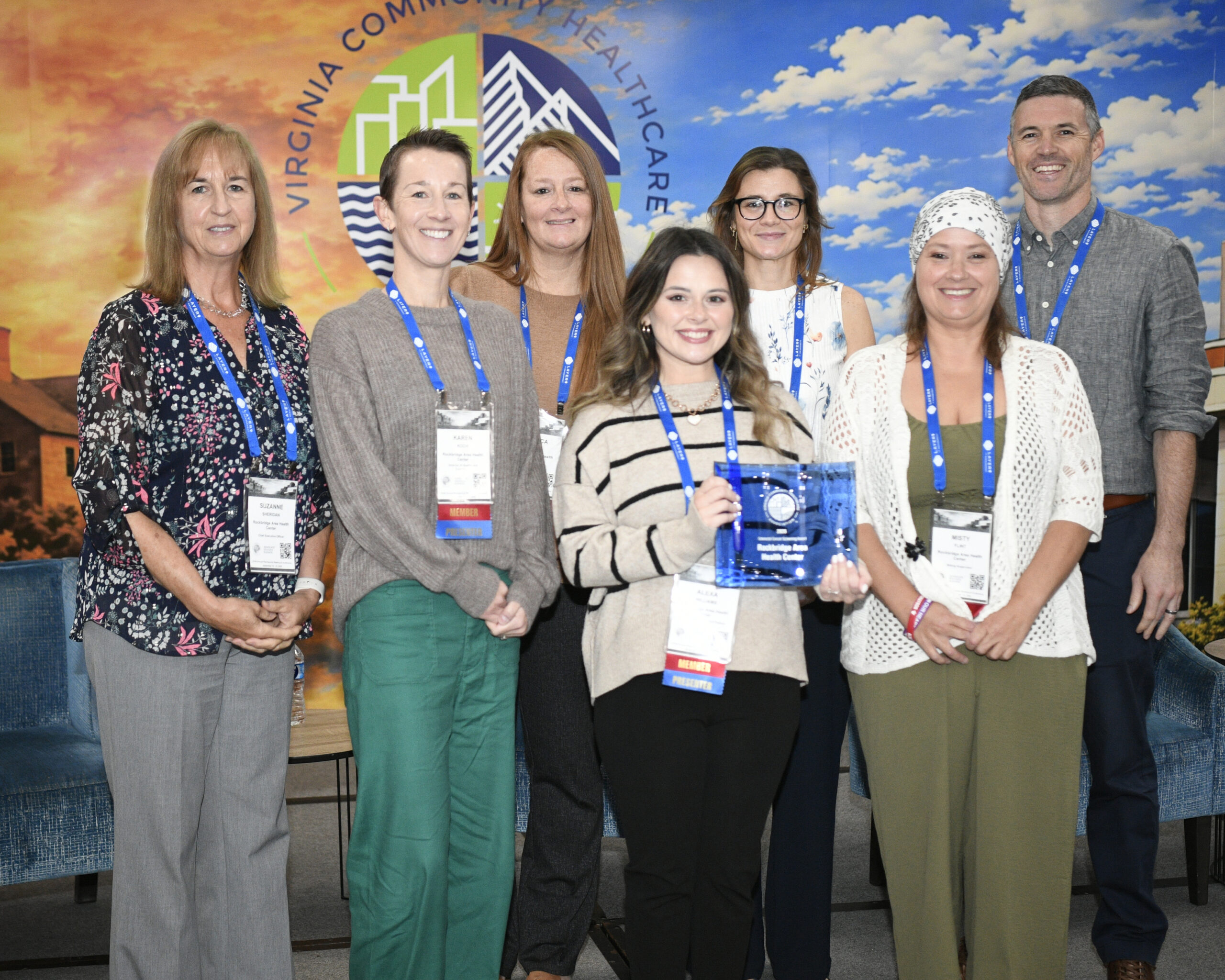 Staff from Rockbridge Area Health Center on stage holding the Colorectal Cancer Screening Award