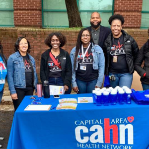 Group of Capital Area Health Network Employees by an event table